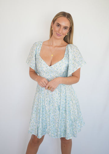 Eliza® | Lock Eyes long sleeve V-neck babydoll dress with ruffle hem in stone/green